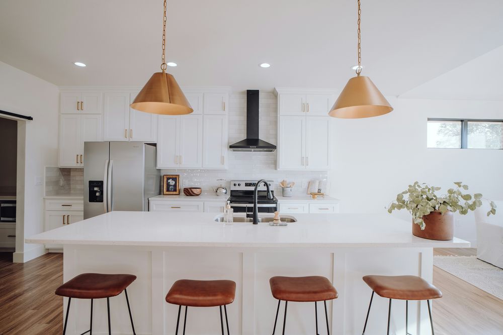 Sample image: a bright kitchen with pendant lights over the island