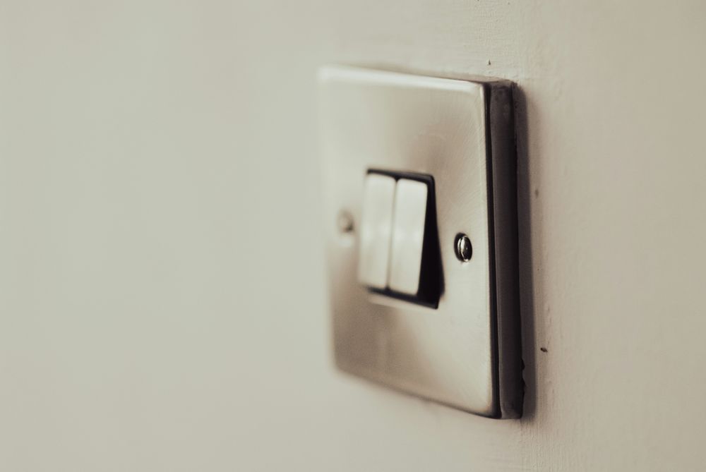 Sample image: a light switch on a painted wall